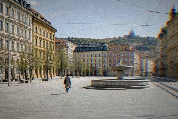 Group of walkers following a guide through an old square