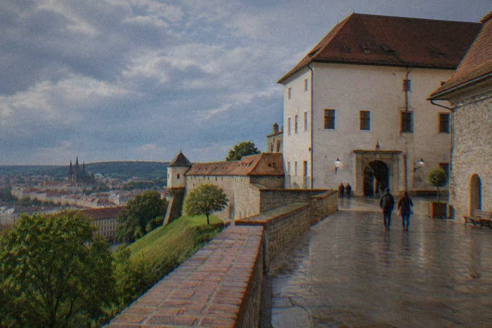 The fortified walls and courtyard of Špilberk Castle above the city of Brno