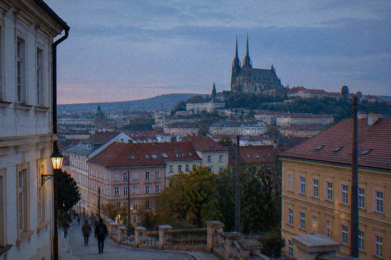 View over Brno city rooftops with the twin spires of the Cathedral of Sts Peter and Paul rising above the skyline
