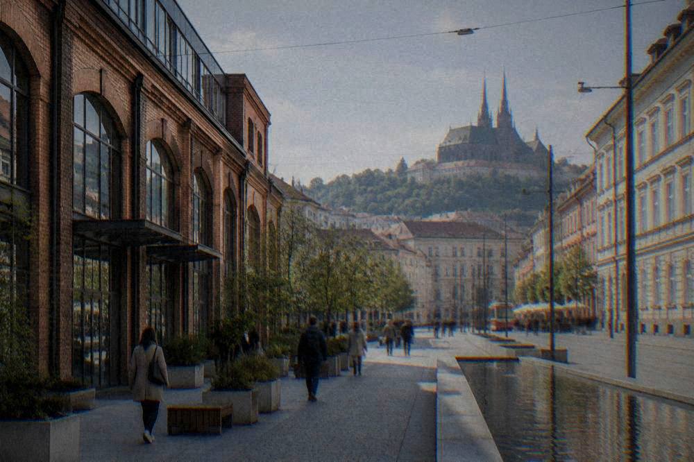 A historic industrial facade converted into a modern shopping gallery near Brno station