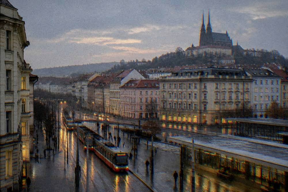Evening light over the rooftops and tram lines around Brno main station