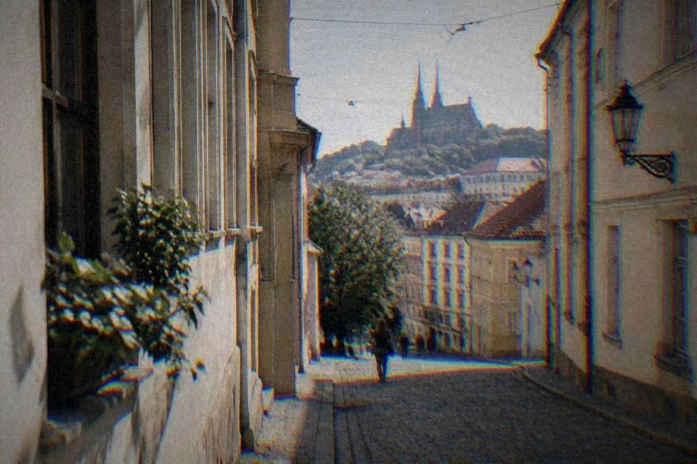 Narrow lane in the old centre with pale facades