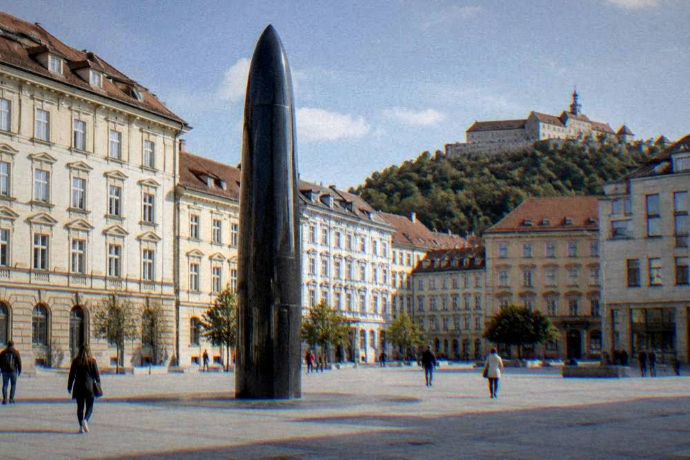 People walking across a historic square with a castle on a hill in the background