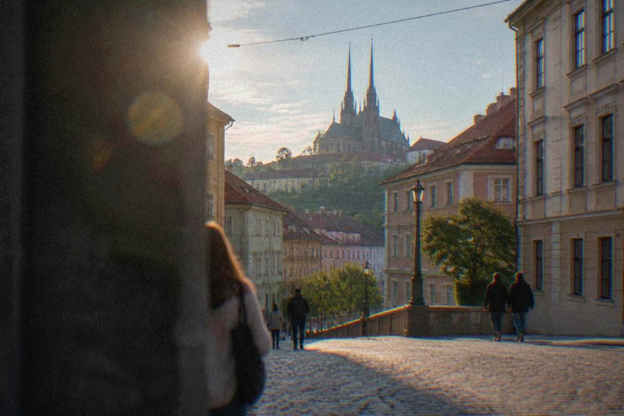 Twin gothic spires of the Cathedral of Sts Peter and Paul rising above the rooftops of Brno