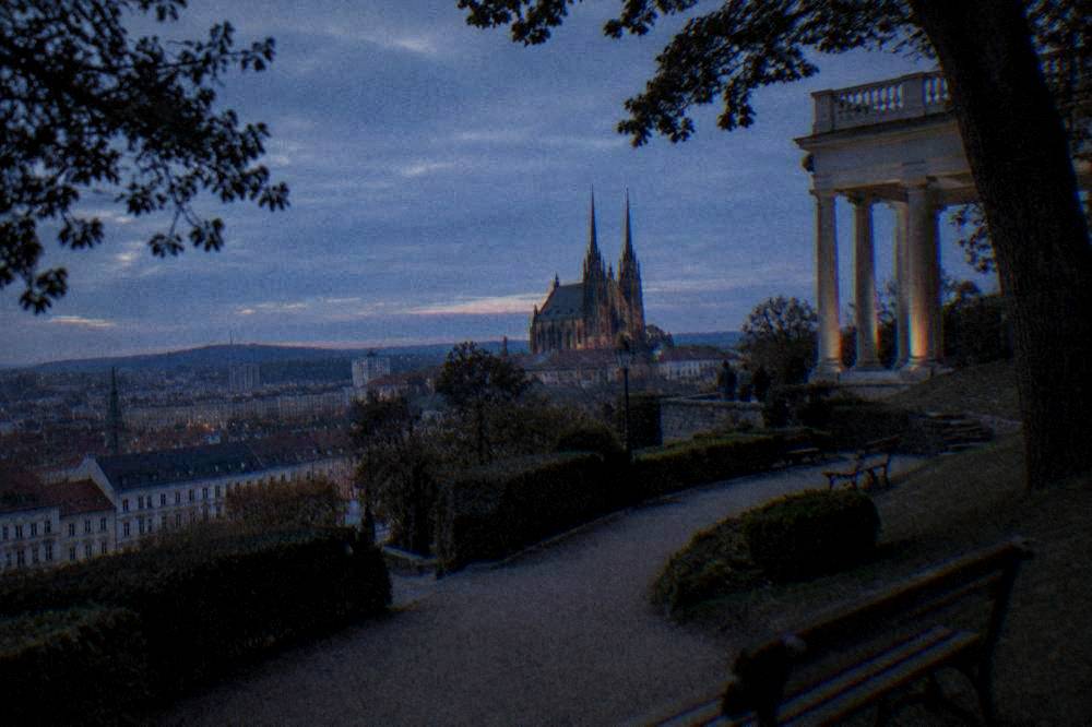 Twin spired cathedral seen from garden terraces on the same hill