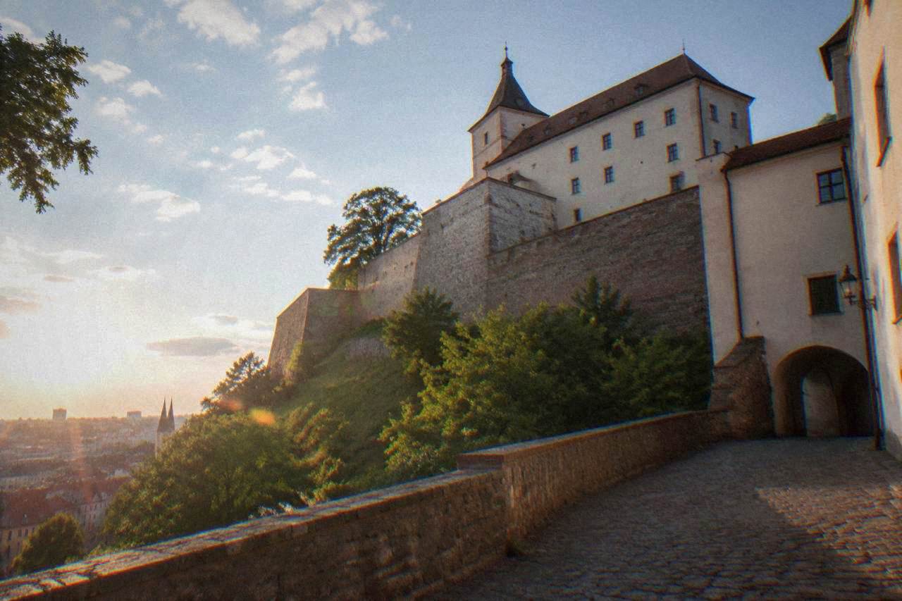 Špilberk Castle walls and courtyard on a hill above Brno's rooftops