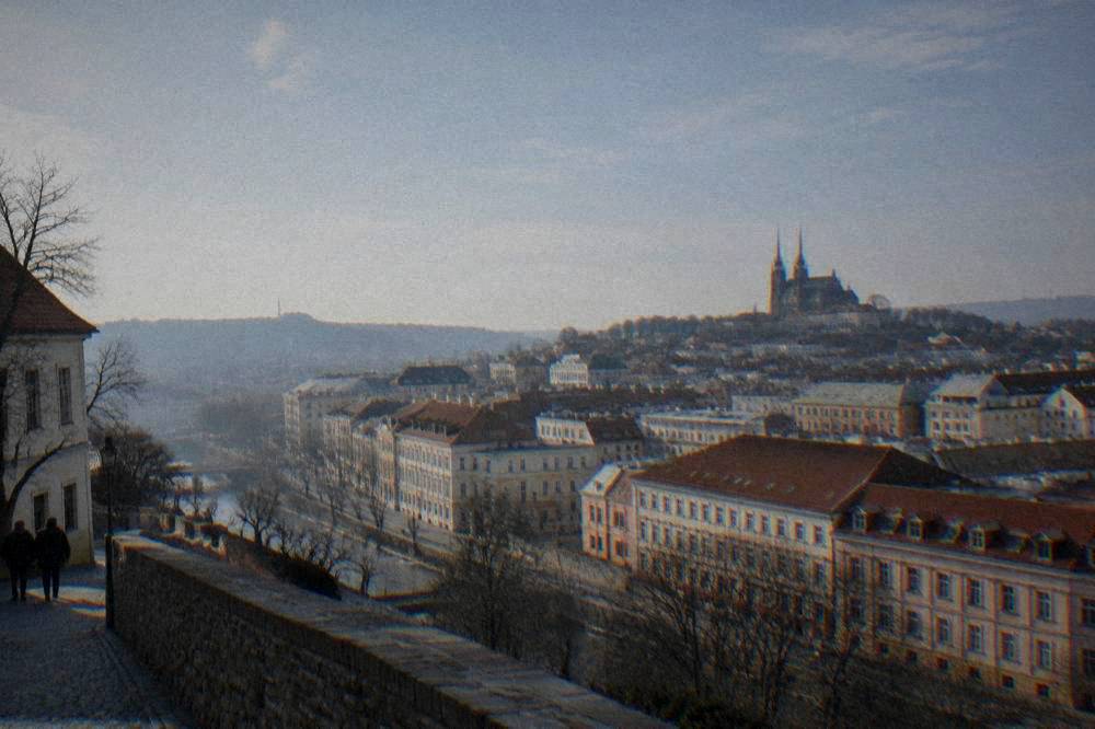 View over Brno rooftops toward the cathedral towers from Špilberk hill