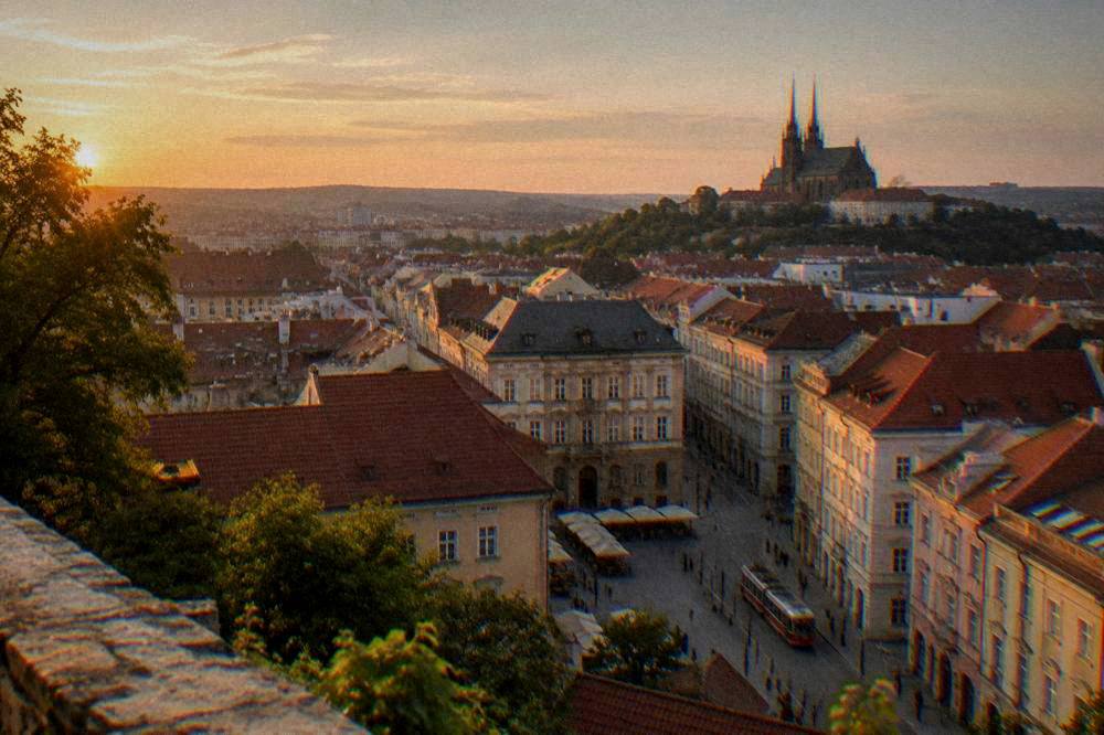 Brno old town rooftops seen from the castle hill at golden hour