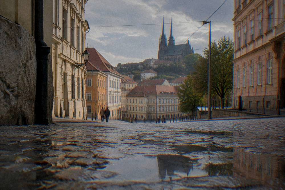Twin spires of the Cathedral of Sts Peter and Paul above Brno rooftops