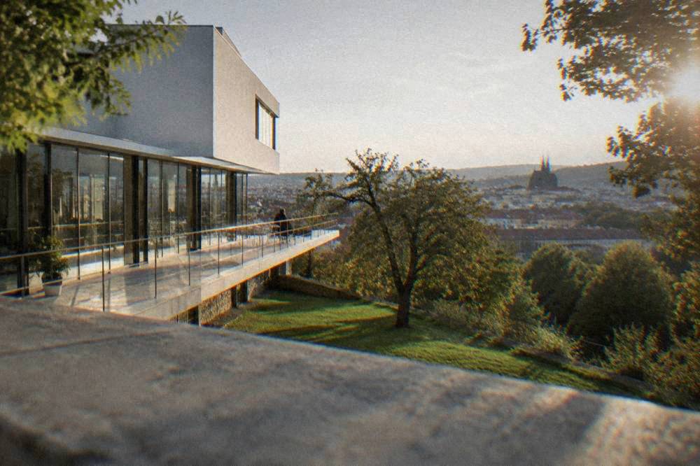 A long terrace overlooking treetops and city rooftops from a modernist villa