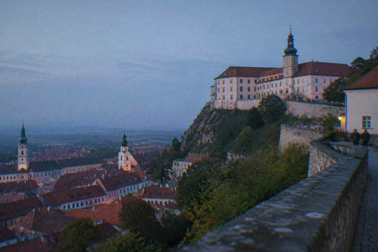 Mikulov castle on a hill above the town's rooftops and church towers