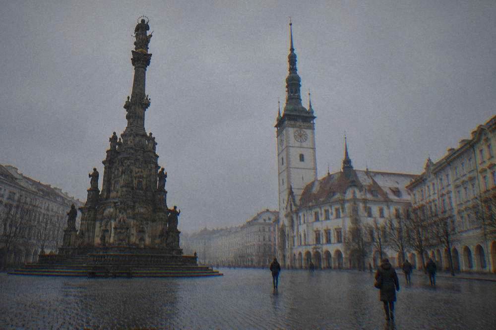Empty cobbled square in Olomouc under a grey winter sky