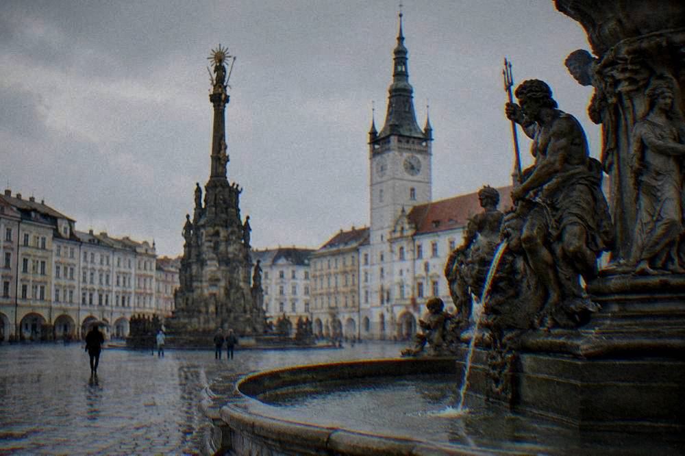 Ornate baroque fountain with mythological figures in an Olomouc square