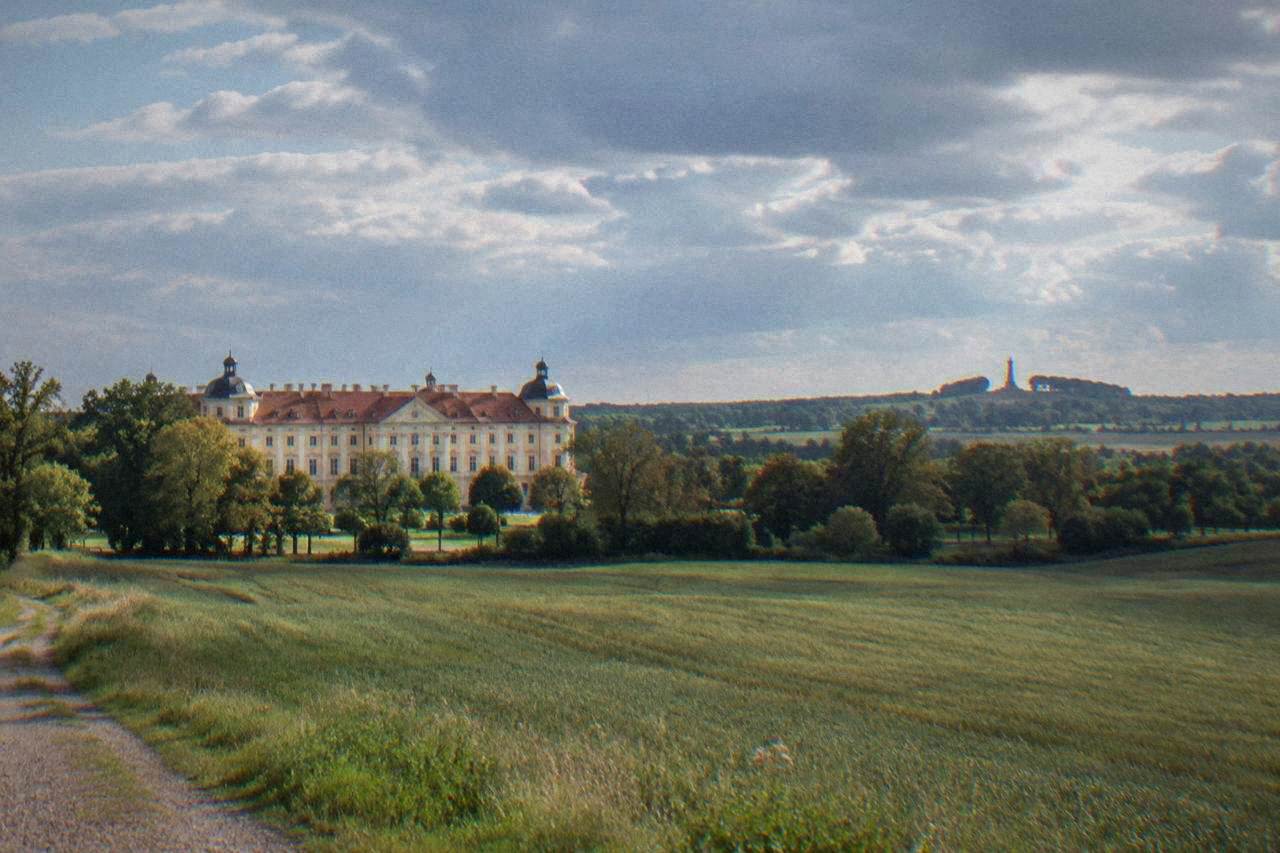 Open countryside near Slavkov u Brna with fields and a distant monument under a wide sky