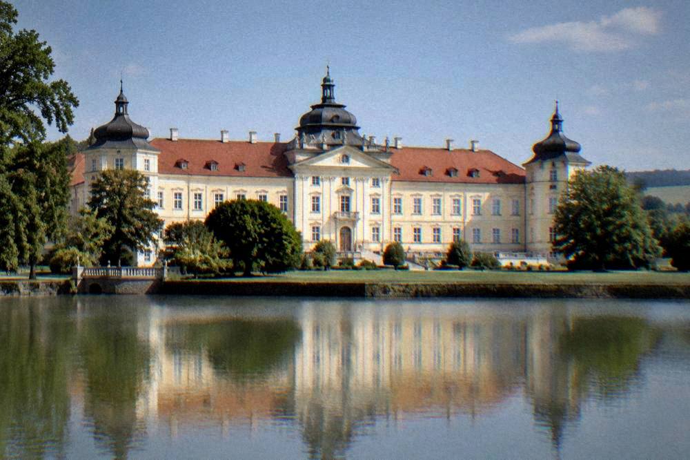 The front facade of a baroque chateau in Slavkov u Brna on a clear day
