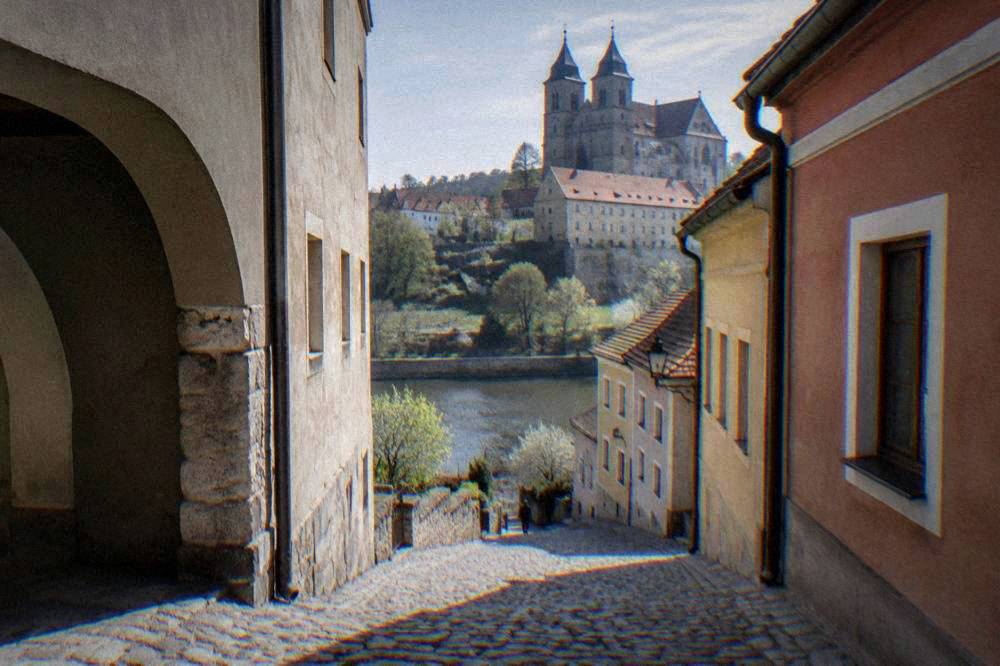 Cobbled lane and coloured house facades in the Třebíč Jewish Quarter