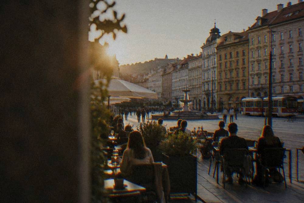 Evening crowds at outdoor tables on Freedom Square in Brno