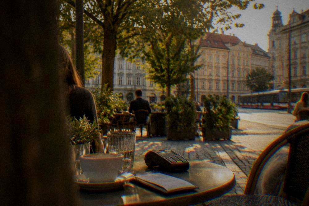 Restaurant bill and card terminal on a cafe table