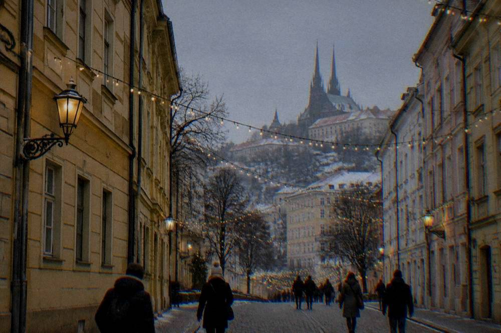 Festive lights strung across a narrow Old Town street in Brno in winter