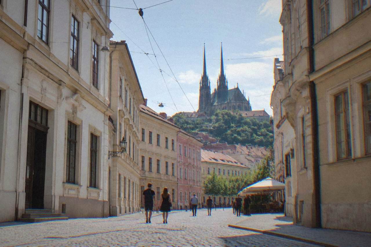 Twin Gothic spires of the Cathedral of Sts Peter and Paul rising above the rooftops of Brno