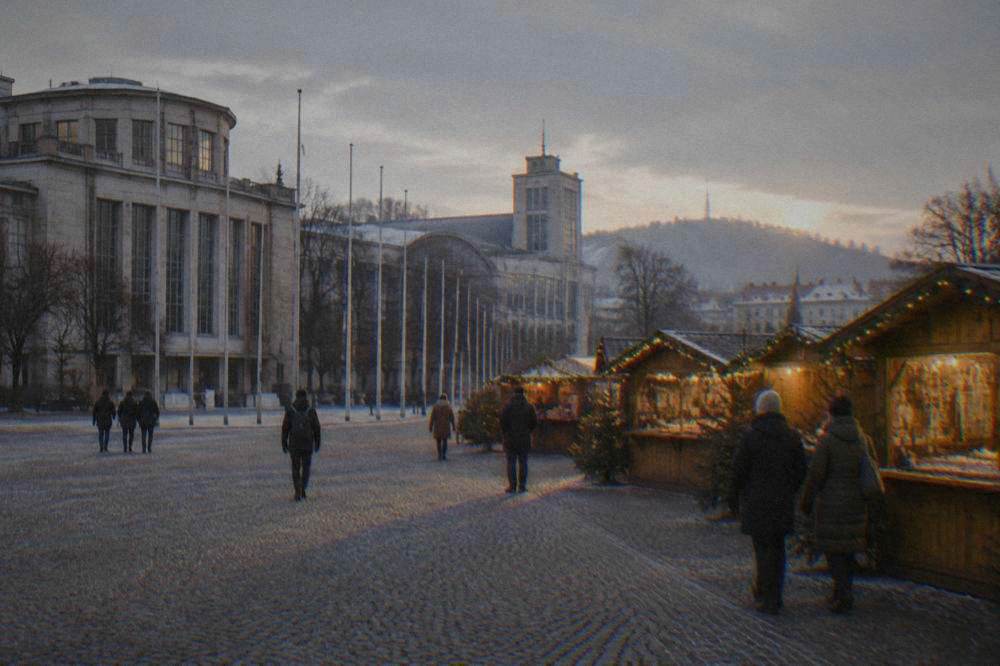 Wooden Christmas market stalls with warm lights on a cobbled square at dusk