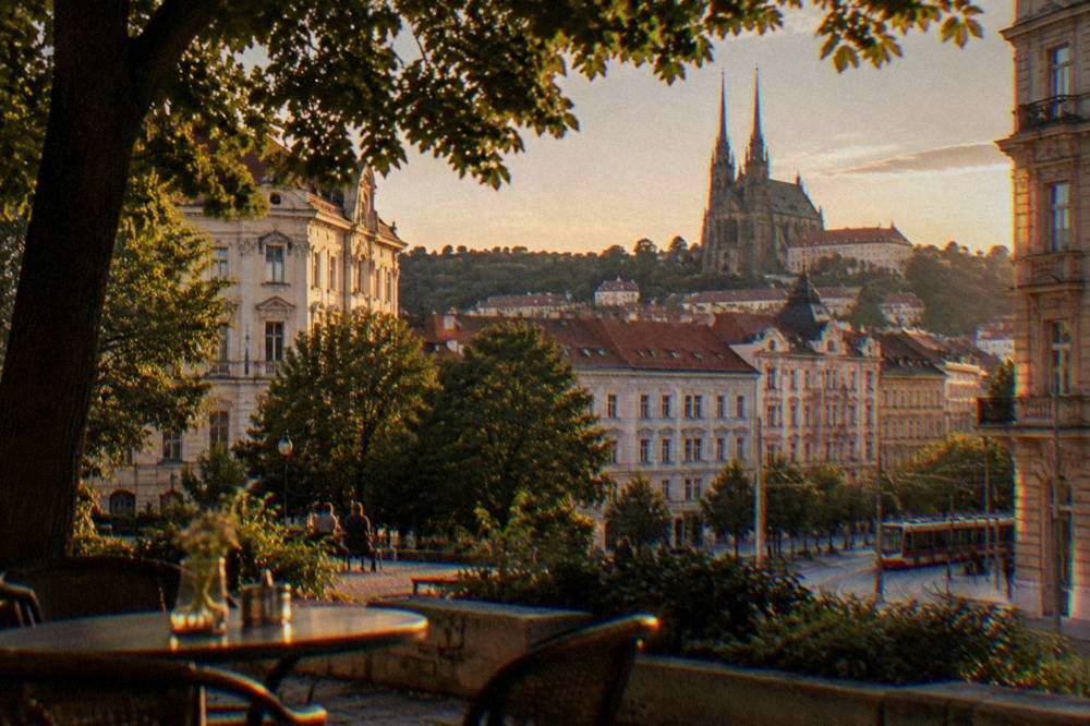 The twin spires of the Cathedral of Sts Peter and Paul seen from a garden terrace in Brno