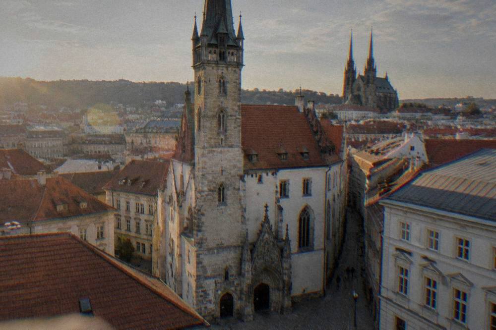 Twin neo-Gothic spires of the Cathedral of Sts Peter and Paul seen from Brno rooftops