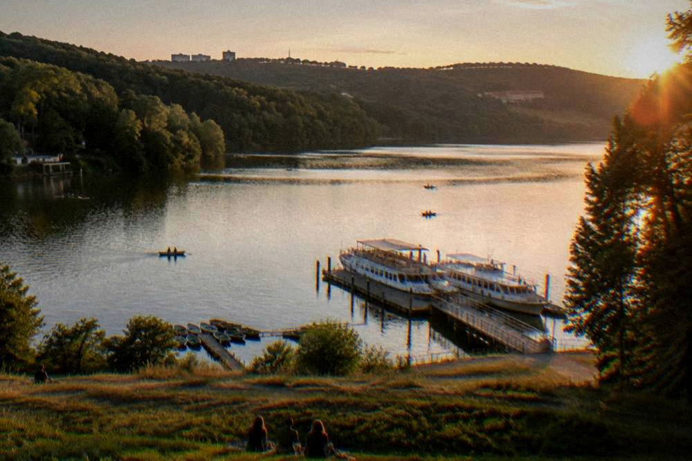 Evening light on the Brno Reservoir water with forested banks
