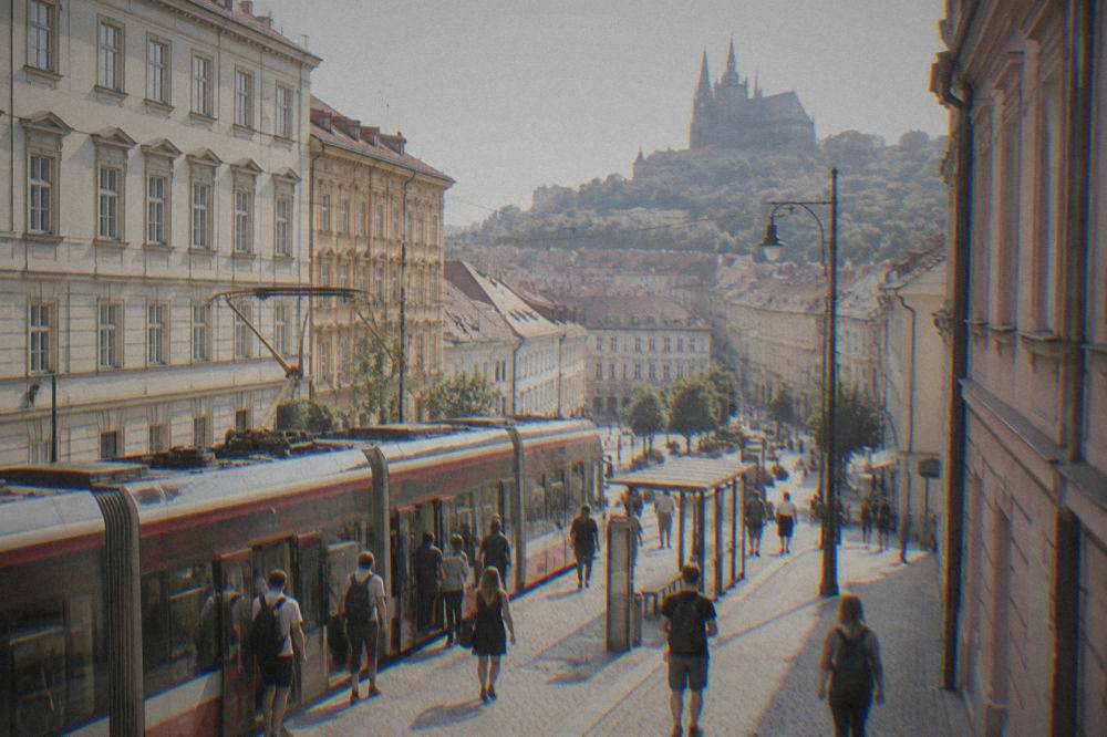 Passengers boarding a tram at a stop in Brno city centre