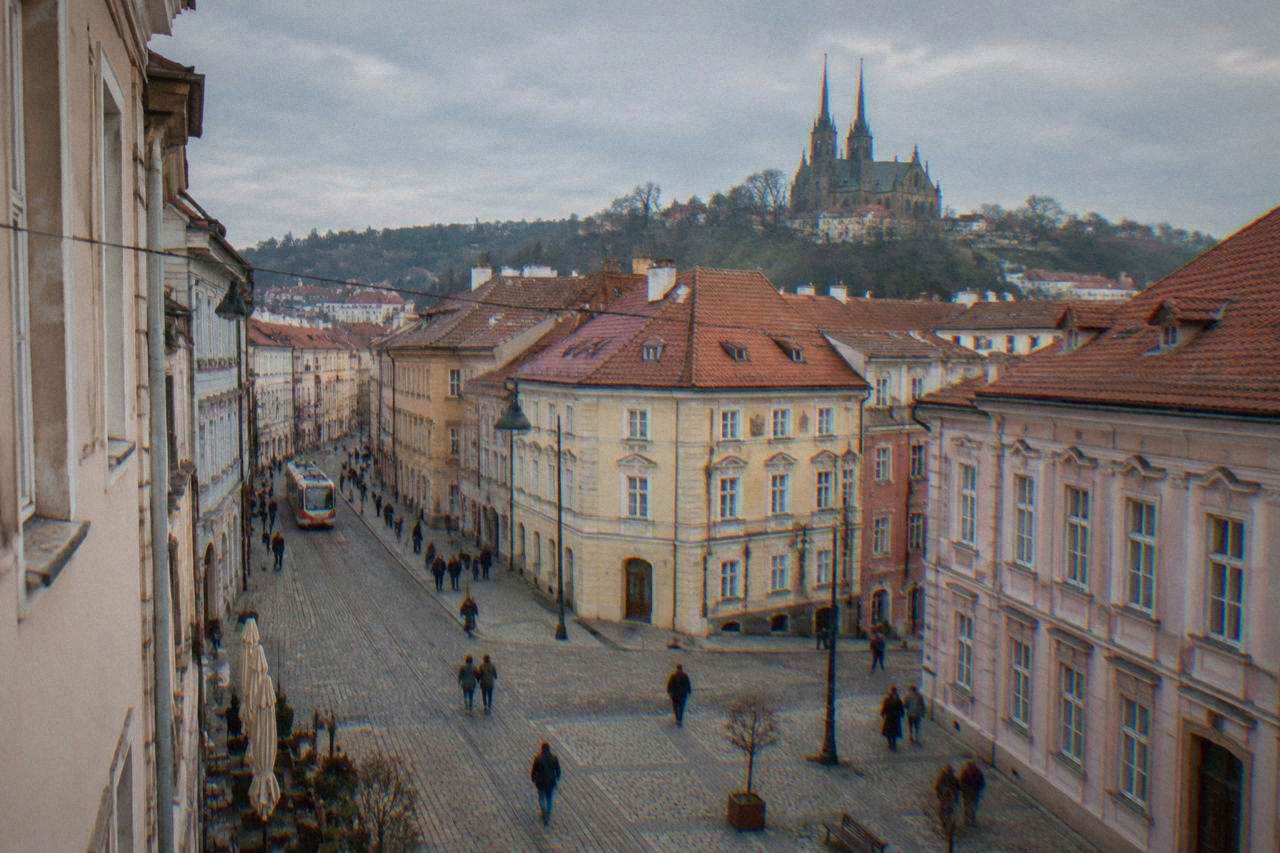 The twin spires of the Cathedral of Sts Peter and Paul rising above rooftops in Brno
