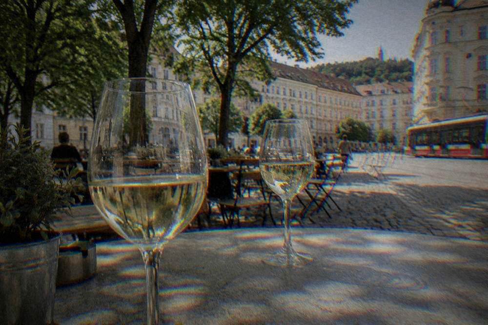 Glasses of white wine on a stone table