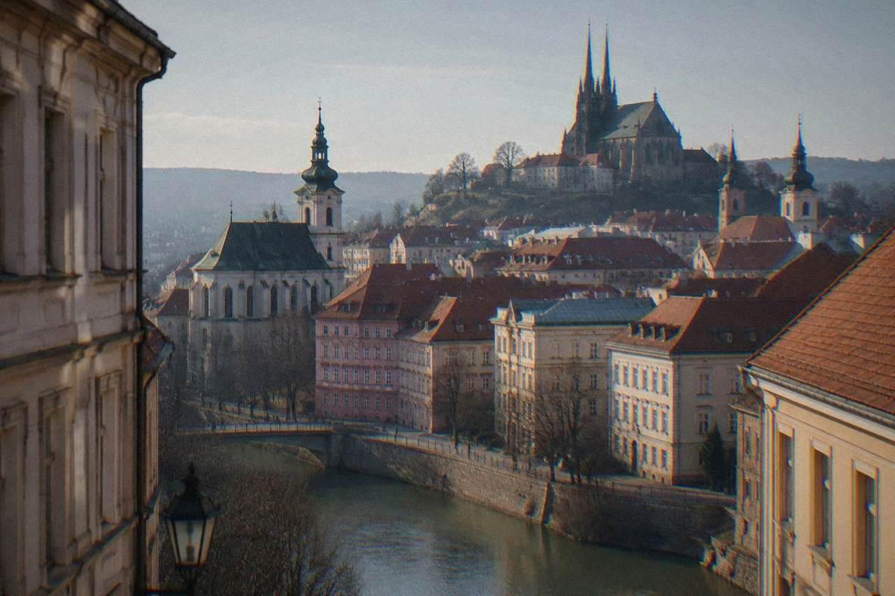 View over the red rooftops and church towers of Brno city centre on a clear day