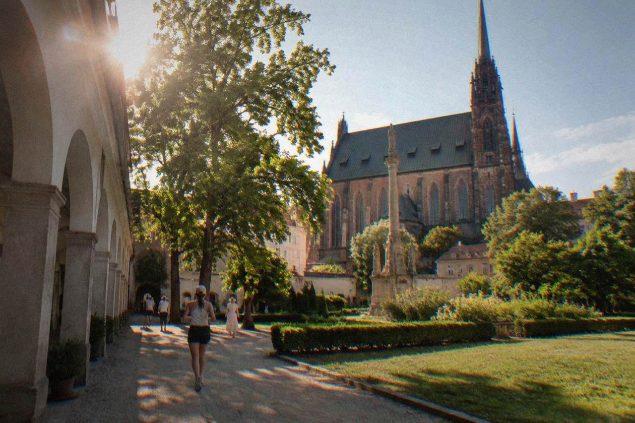 The grounds of the Augustinian abbey in Old Brno with the Basilica of the Assumption beside green gardens