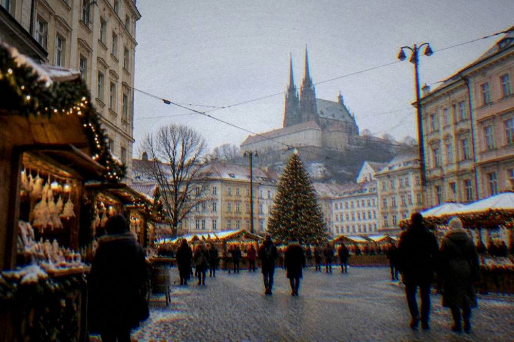 Historic square in Brno with outdoor Christmas market stalls and lights