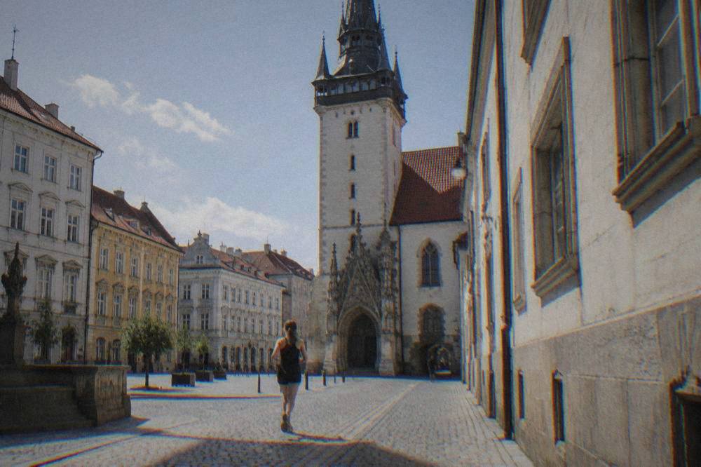 The Old Town Hall tower rising above the colourful facades of central Brno