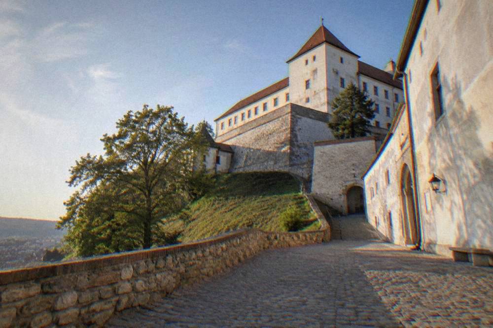 The courtyard and defensive walls of Špilberk Castle in morning light
