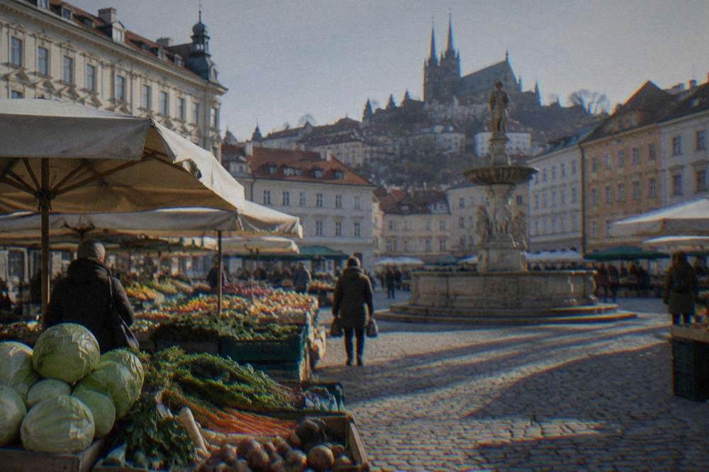 Market stalls and historic facades around the Cabbage Market in Brno