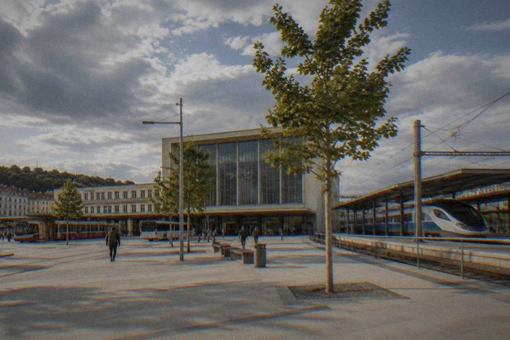 A modern express train at a platform beside a station hall